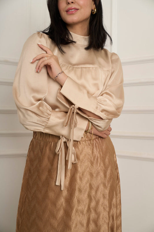 Escape the ordinary blouse in champagne