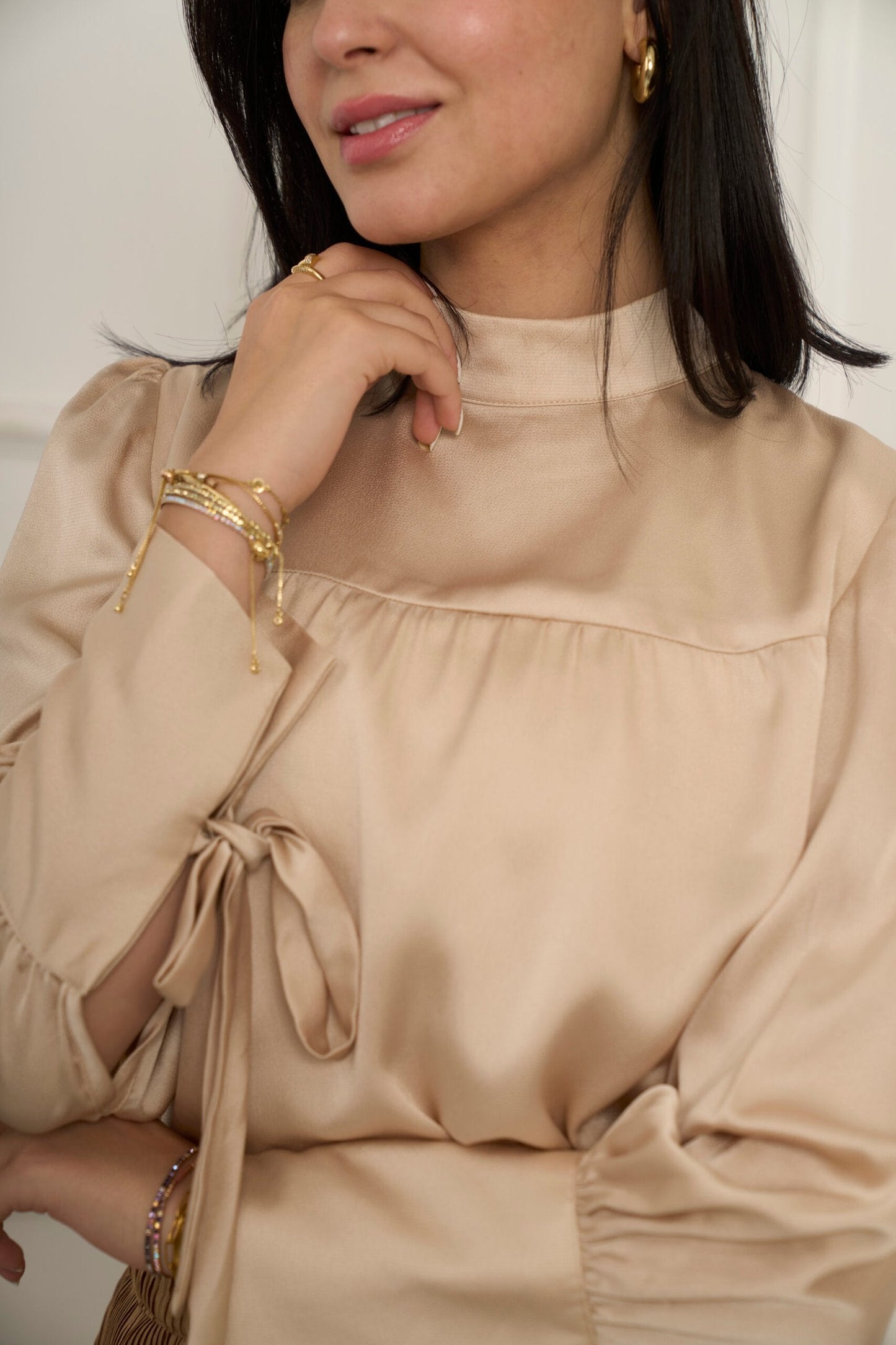 Escape the ordinary blouse in champagne